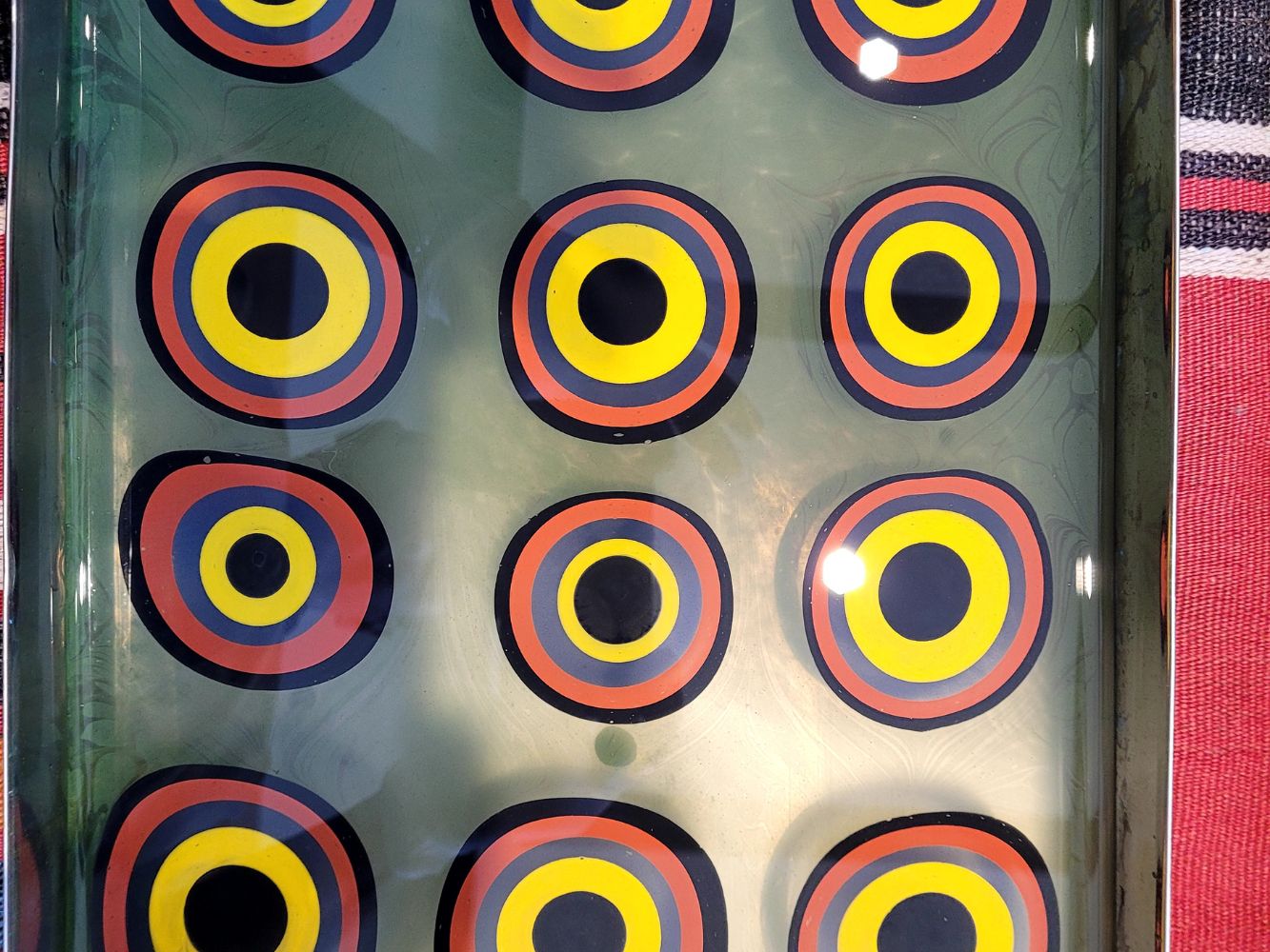 Ebru marbled paper with striking colorful concentric circles pattern