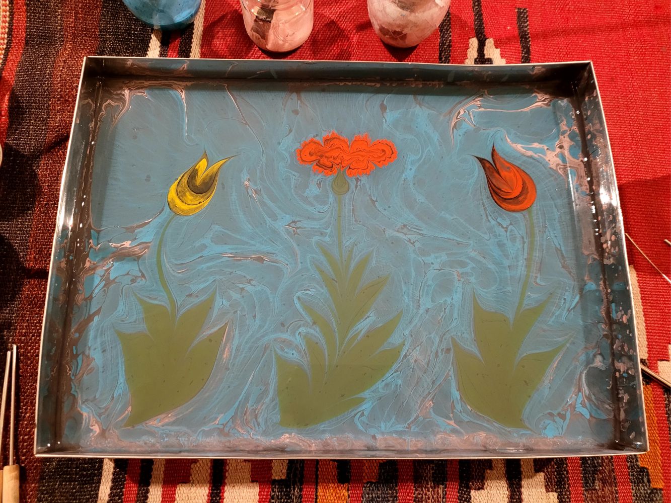 Ebru art in progress — work forming in the marbling tray
